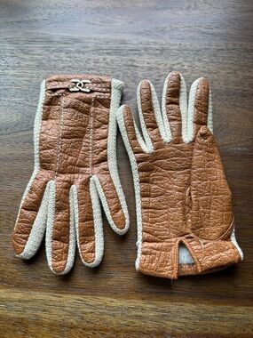 vintage Aris Novakid leather gloves featuring a gold buckle accent